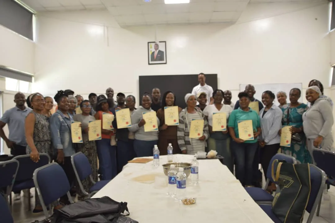 Graduates of an Arctic Clima biltong making workshop holding their certificates