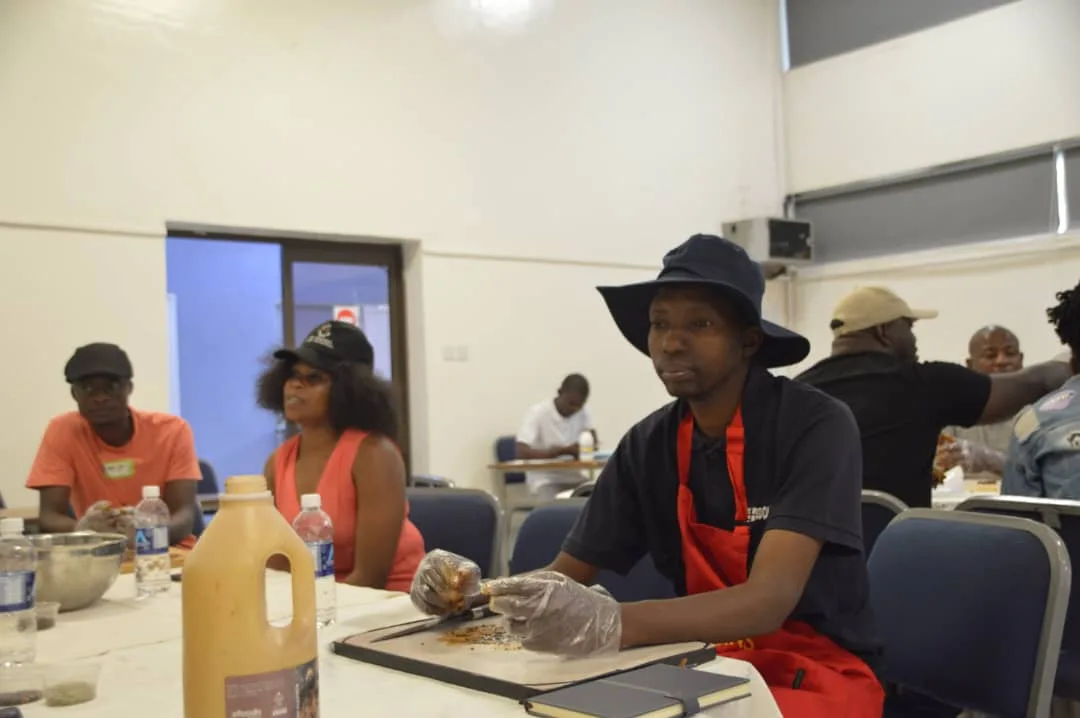 Arctic Clima workshop participant learning to spice biltong